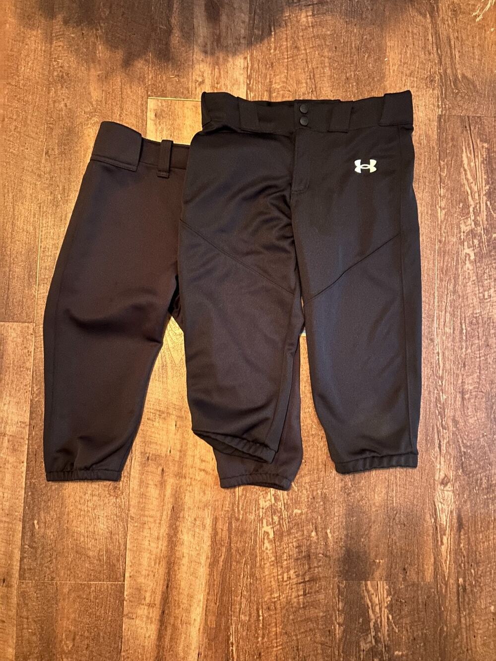 two pairs of black youth baseball knicker pants size large